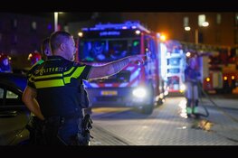 Flat deels ontruimd vanwege brandende auto