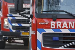 Caravan verwoest door brand in Muziekwijk