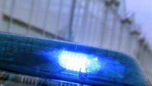 Drie mannen met wapens aangehouden